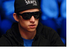 -- Peter Eastgate wearing dark shades and a Pokerstars hat --