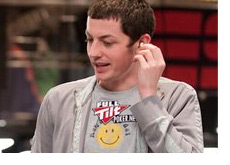 -Tom Dwan standing up - Wearing a smiley face shirt